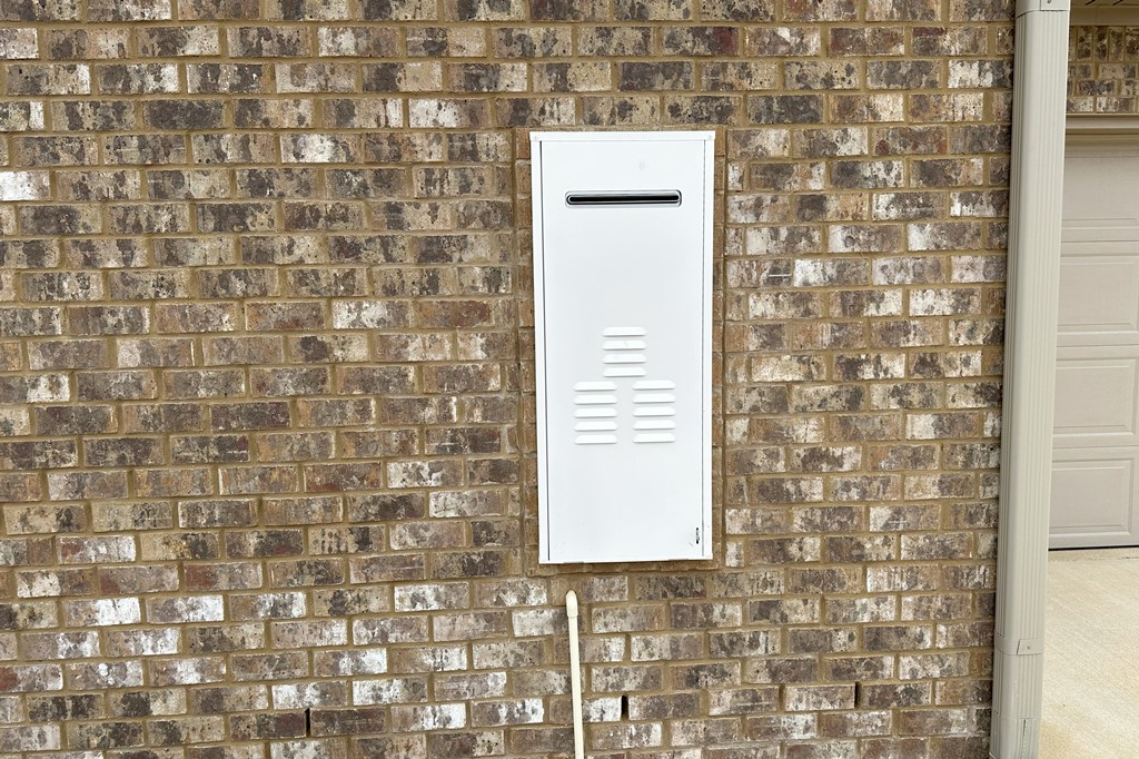 Tankless Hot water Heater And Gutters