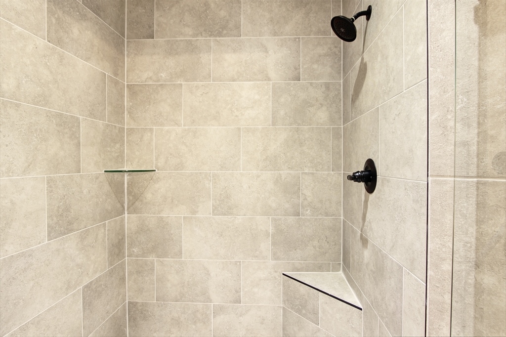 MasterBath Tiled Shower With Seat
